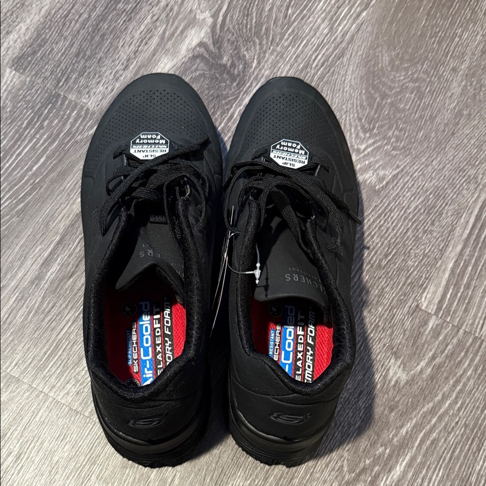 Skechers Women’s Black Sneakers with Red Insole Accents